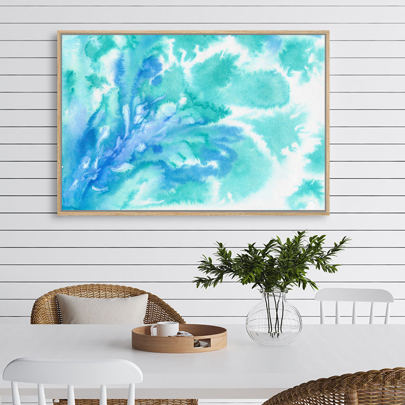 Aquamarine canvas art print with watercolour swirls that resemble the graceful movements of seawater, in a coastal interior.